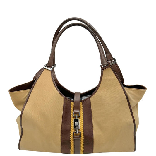 Borsa Gucci Bardot in tessuto beige con finiture in pelle marrone rifinita con parti metalliche argentate; munita di doppi manici