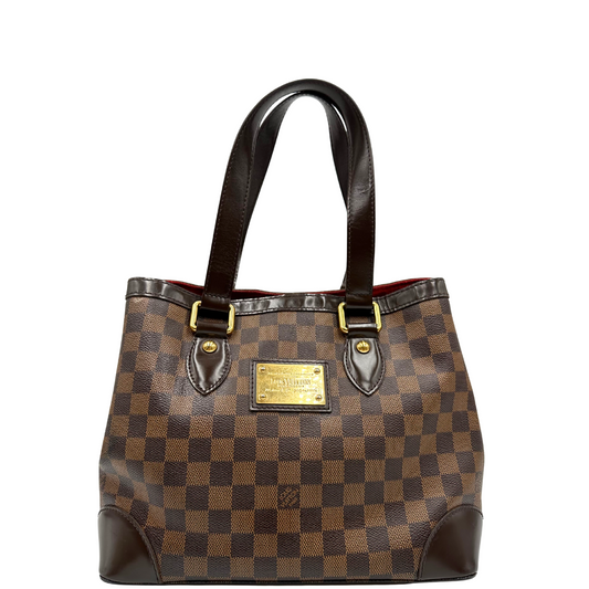 Front di una borsa Hampstead Louis Vuitton in canvas marrone Damier Ebene con finiture in pelle testa di moro e parti metalliche dorate. Completa di dustbag.