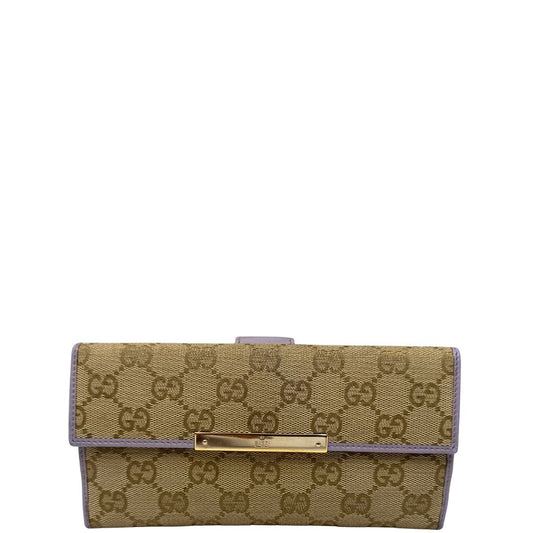Portafoglio Gucci in tessuto GG beige e finiture in pelle lilla, rifinito con parti metalliche dorate, front