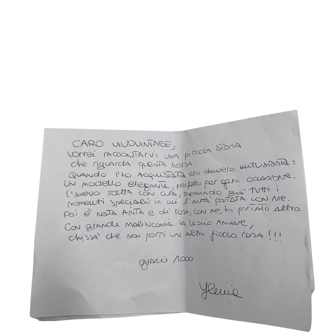 Lettera di una borsa Zanellato in nylon rosa e parti in pelle tono su tono. Dettagli metallici argentati; munita di un manico con nodi e una tracolla amovibile e regolabile. Completa di dustbag.