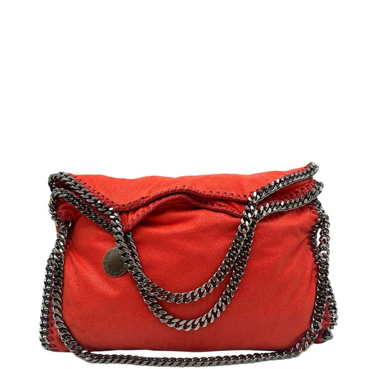 Borsa Stella McCartney Falabella in tessuto vegano color corallo rifinita con catene in metallo argentato. Completa di dustbag, di lusso, originale, ottime condizioni.