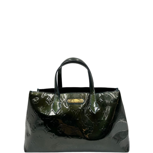 front Borsa Louis Vuitton in pelle verniciata color verde bottiglia e parti metalliche dorate; munita di doppi manici, da portare a mano. Completa di dustbag, di lusso, originale, ottime condizioni.