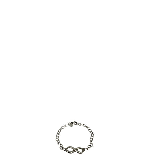 Bracciale Tiffany&Co. in argento 925 con ciondolo "infinito'' Completo di sacchetto antipolvere e scatola, originale, usato, di lusso.