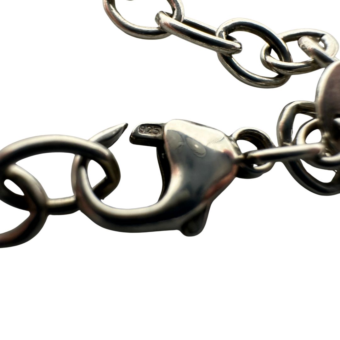 Bracciale Tiffany&Co. in argento 925 con ciondolo "infinito'' Completo di sacchetto antipolvere e scatola, originale, usato, di lusso.