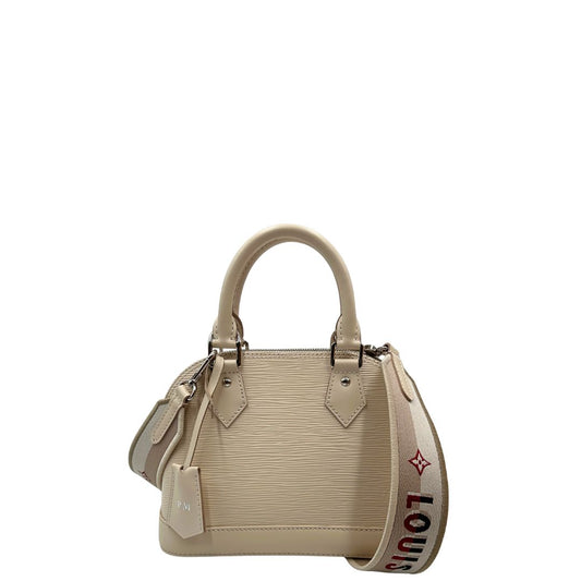 front Borsa Louis Vuitton in pelle epi color bianco quarzo con parti metalliche argentate; munita di doppi manici stondati e una tracolla Jacquard logata, amovibile e regolabile. Completa di corredo, chiavi e lucchetto, di lusso, originale, ottime condizioni, usata.