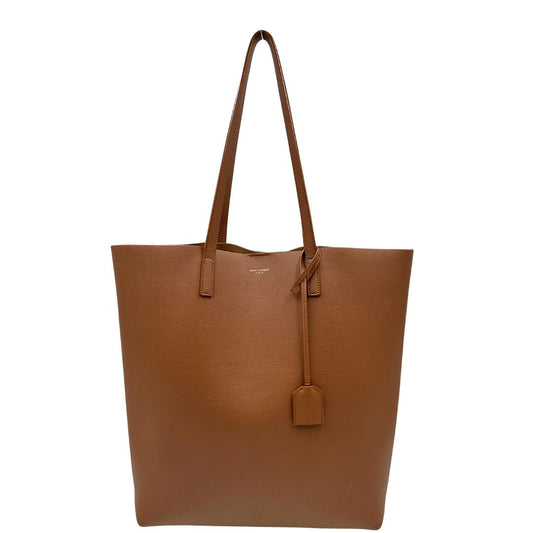 Front di una shopping Saint Laurent in pelle marrone con hardware dorato, usata, originale, in ottime condizioni.