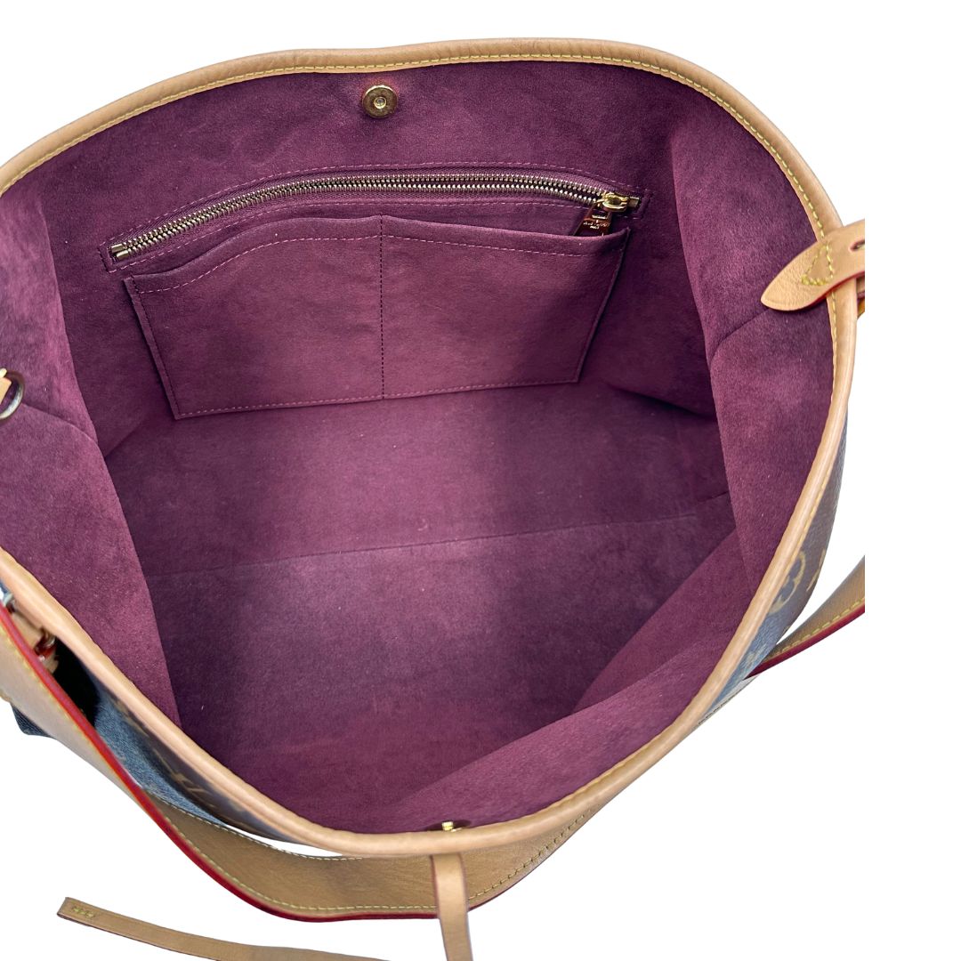 interno Borsa CarryAll MM realizzata in tela Monogram e rifinita in pelle naturale, di lusso, originale, ottime condizioni, usata.