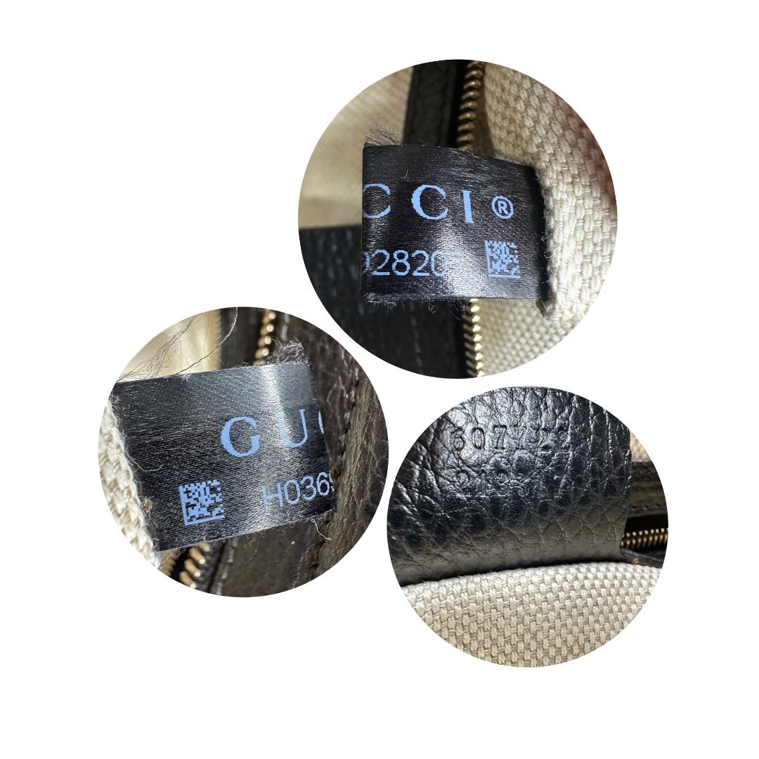 Codici di una borsa Gucci in pelle martellata nera, con parti metalliche dorate, indossabile a mano o a tracolla, usata, originale, second hand, in ottime condizioni.