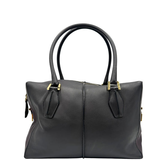 front Bauletto Tod's in pelle color grigio antracite e viola melanzana, indossabile a spalla, di lusso, originale, ottime condizioni, usato.