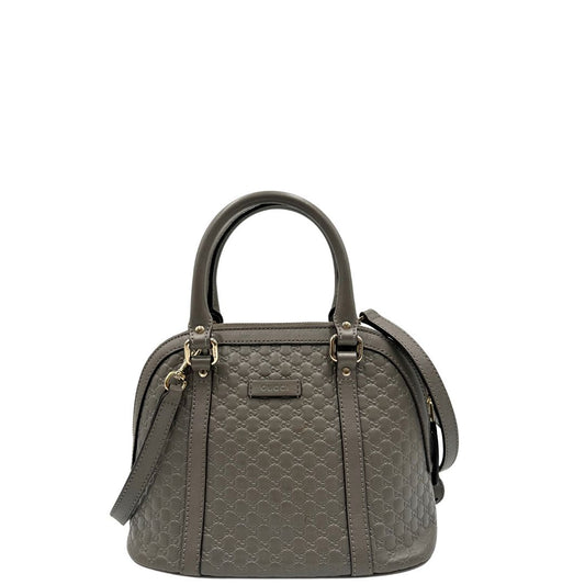 front Borsa Gucci in pelle microgucissima grigia, di lusso, originale, ottime condizioni, usata.