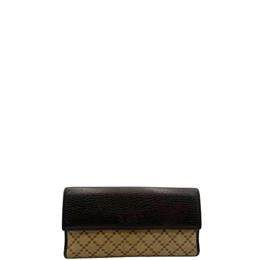 Portafoglio Gucci in pelle marrone e tessuto beige; munito di scatola, di lusso, originale, ottime condizioni, usato.