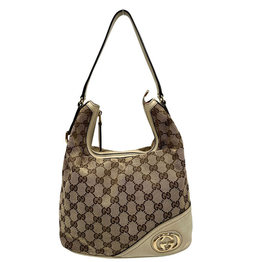front Borsa Gucci in tessuto GG monogram beige con parti metalliche dorate e finiture in pelle; munita di un manico singolo, da portare a spalla