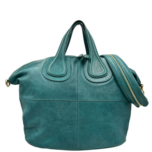 Borsa Nightingale Givenchy in pelle turchese munita di doppi manici e una tracolla amovibile impreziosita da una cerniera. parti metalliche dorate. Originale, usato, in condizioni ottime.