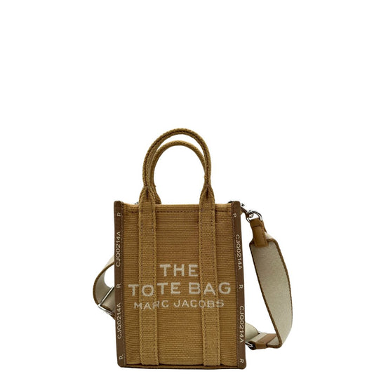 Front The Tote Bag Marc Jacobs in tessuto Jacquard con tracolla regolabile e amovibile in tessuto Bianco, rifinita con parti metalliche argentate.