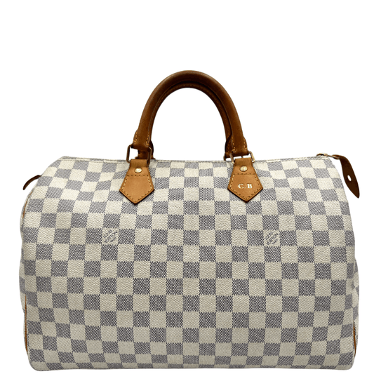 Front di un bauletto Speedy 35 Louis Vuitton in canvas Damier Azur con finiture in vacchetta naturale e parti metalliche dorate.