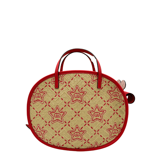 Borsa Gucci Bambina a forma di lumaca in rafia con trama GG e stampa decorativa con stelle. Finiture in pelle rossa e munita di doppi manici. Completo di cartellino. Originale, usato, in condizioni ottime.