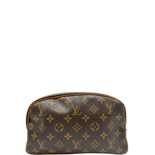 front trousse in canvas marrone monogram con finiture in vacchetta naturale e parti metalliche dorate.