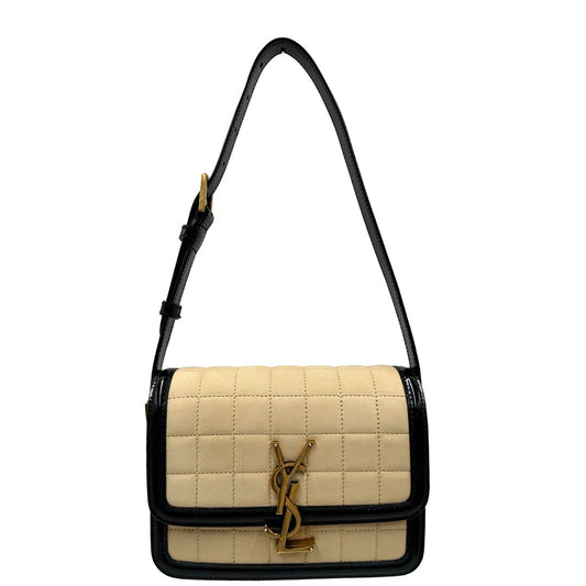 front Borsa Saint Laurent in pelle nabuk beige e pelle lucida nera con parti metalliche dorate, impreziosita da iconico logo Cassandre sul front; munita di un manico regolabile. Completa di corredo.