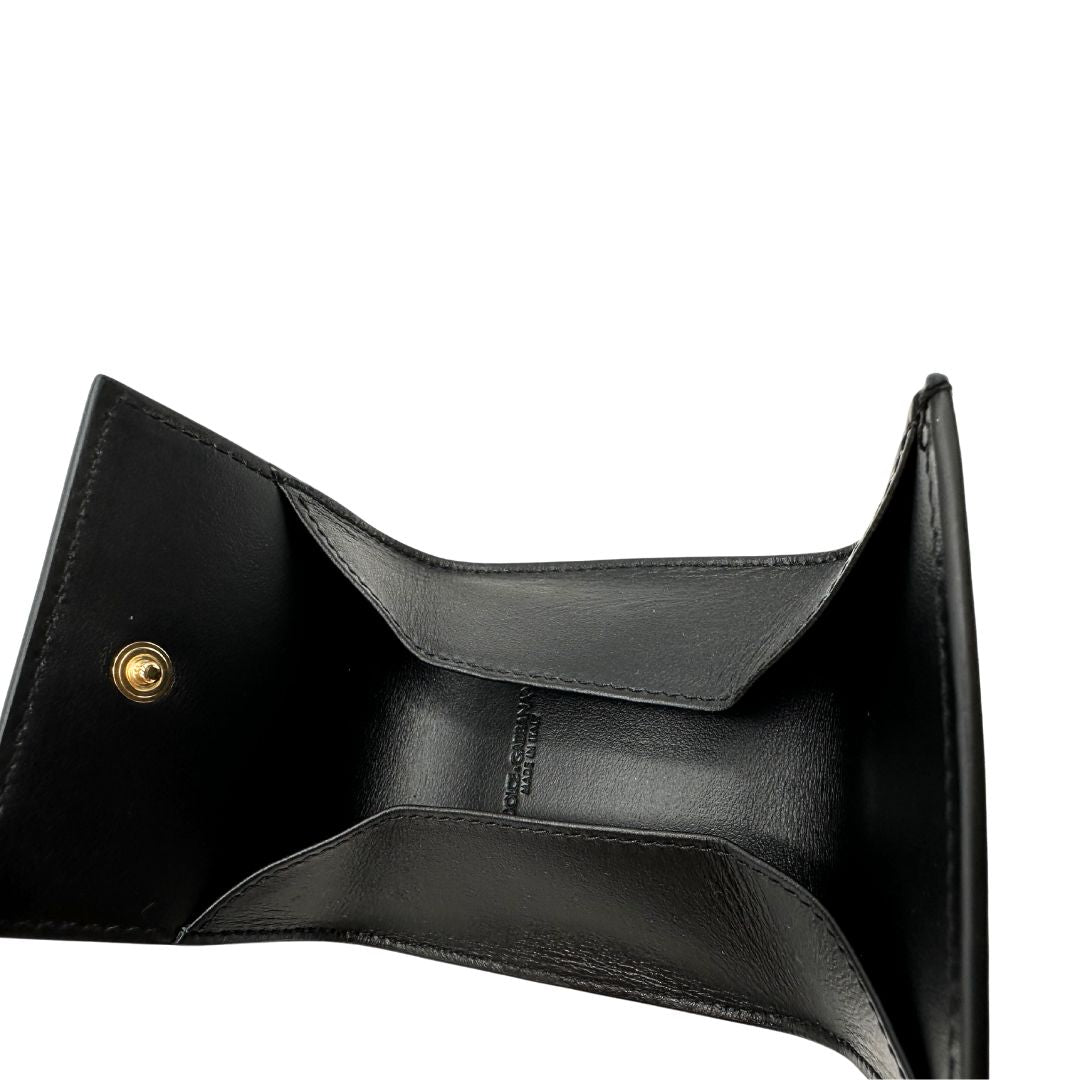 Portamonete Dolce & Gabbana in pelle nera con dettagli dorati. Completo di corredo, di lusso, originale, eccellenti condizioni.