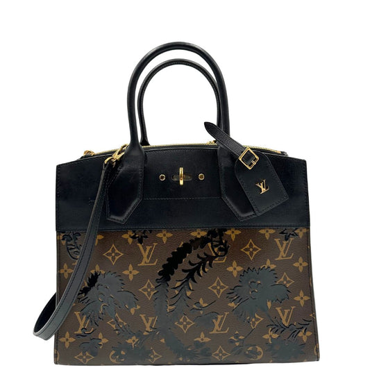 front Borsa Louis Vuitton L.E. in canvas marrone monogram con finiture in pelle nera e parti metalliche dorate, impreziosita da motivo decorativo floreale verniciato nero e un porta address amovibile; munita di doppi manici stondati e una tracolla amovibile. Completa di dustbag, di lusso, originale, ottime condizioni.