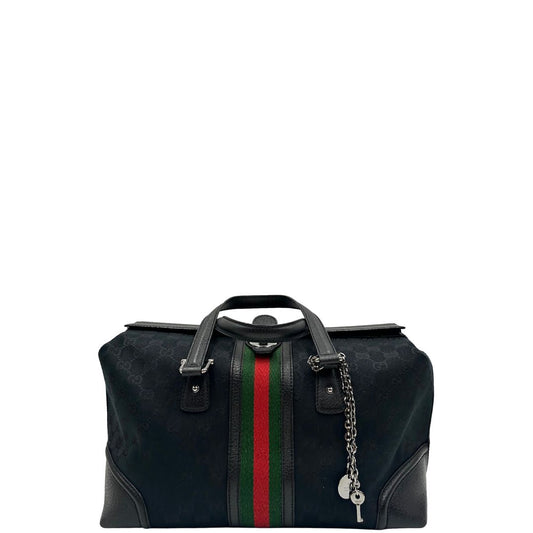front Borsa Gucci in tessuto GG nero con finiture in pelle tono su tono e parti metalliche argentate, impreziosita da striscia Web verde e rossa; munita di doppi manici. Completa di dustbag, di lusso , originale, ottime condizioni.