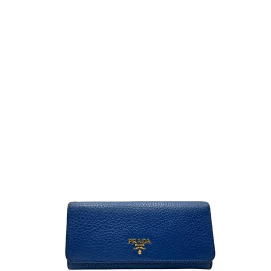 front Portafoglio Prada in pelle blu martellata con parti metalliche dorate. Completo di dustbag, di lusso, originale, ottime condizioni, usata.