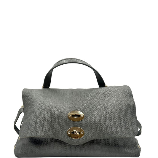 front Borsa Zanellato in pelle trama blandine grigia con parti metalliche argentate; munita di un manico singolo e una tracolla amovibile e regolabile, di lusso, originale, ottime condizioni, usata.