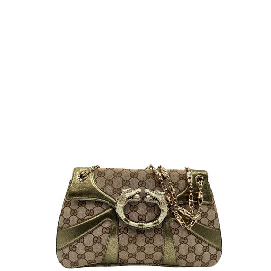 front Borsa Gucci in tessuto GG beige con finiture in pelle e parti metalliche dorate; munita di doppi manici in catena, indossabile a spalla, di lusso, originale, ottime condizioni, usata.