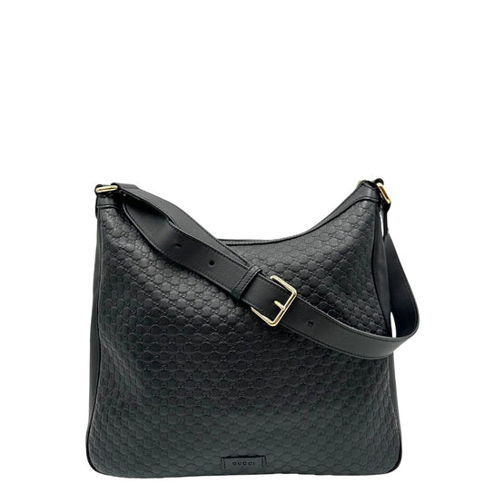 front Borsa Gucci in pelle nera GG con parti metalliche dorate; munita di una tracolla regolabile, di lusso, originale, ottime condizioni, usata.