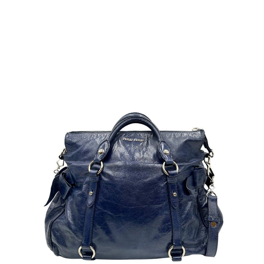 front Borsa Miu Miu in pelle blu con parti metalliche argentate; munita di doppi manici e una tracolla amovibile. Completa di dustbag, di lusso, originale, ottime condizioni, usata, originale.