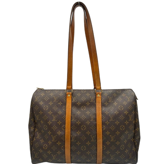 front dellla Borsa Louis Vuitton in canvas marrone monogram con finiture in vacchetta naturale e parti metalliche dorate; munita di doppi manici, indossabile a spalla. Completa di dustbag, di lusso, originale, ottime condizioni, usata.