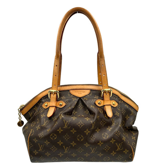 front Borsa Louis Vuitton in canvas marrone monogram con finiture in vacchetta naturale e parti metalliche dorate; munita di doppi manici regolabile, da portare a mano o a spalla. Dotata di dustbag, di lusso, originale, ottime condizioni, usata.