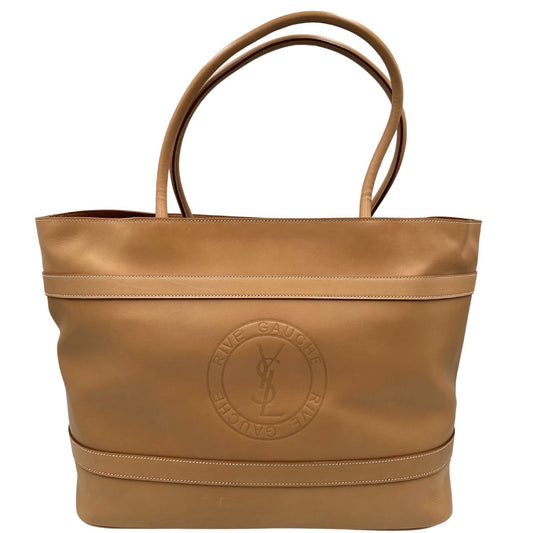 front Borsa Saint Laurent in pelle beige con logo Rive Gauche sul front; munita di doppi manici, indossabile a spalla. Completa di dustbag, di lusso, originale, ottime condizioni, usata.