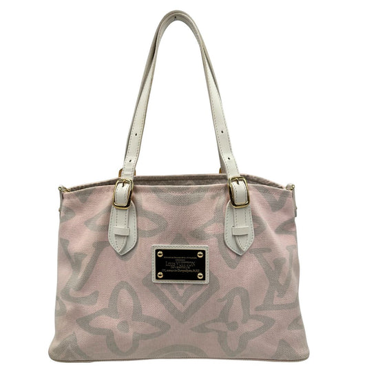 Front, Borsa Louis Vuitton in tela resistente bicolore con motivi floreali coordinati.