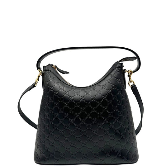 Front, Borsa Gucci in pelle nera GG con hardware dorato. Originale, usata, di lusso, in condizioni eccellenti.