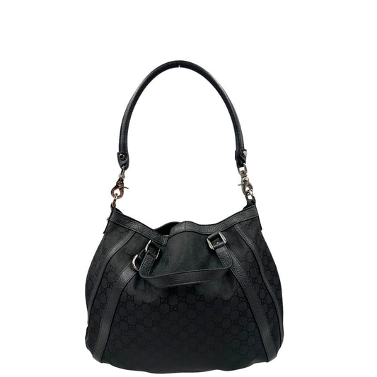 Front, Borsa Gucci in tessuto nero trama GG, con parti metalliche argentate, indossabile a mano o a spalla. Originale, usata, di lusso, in ottime condizioni.