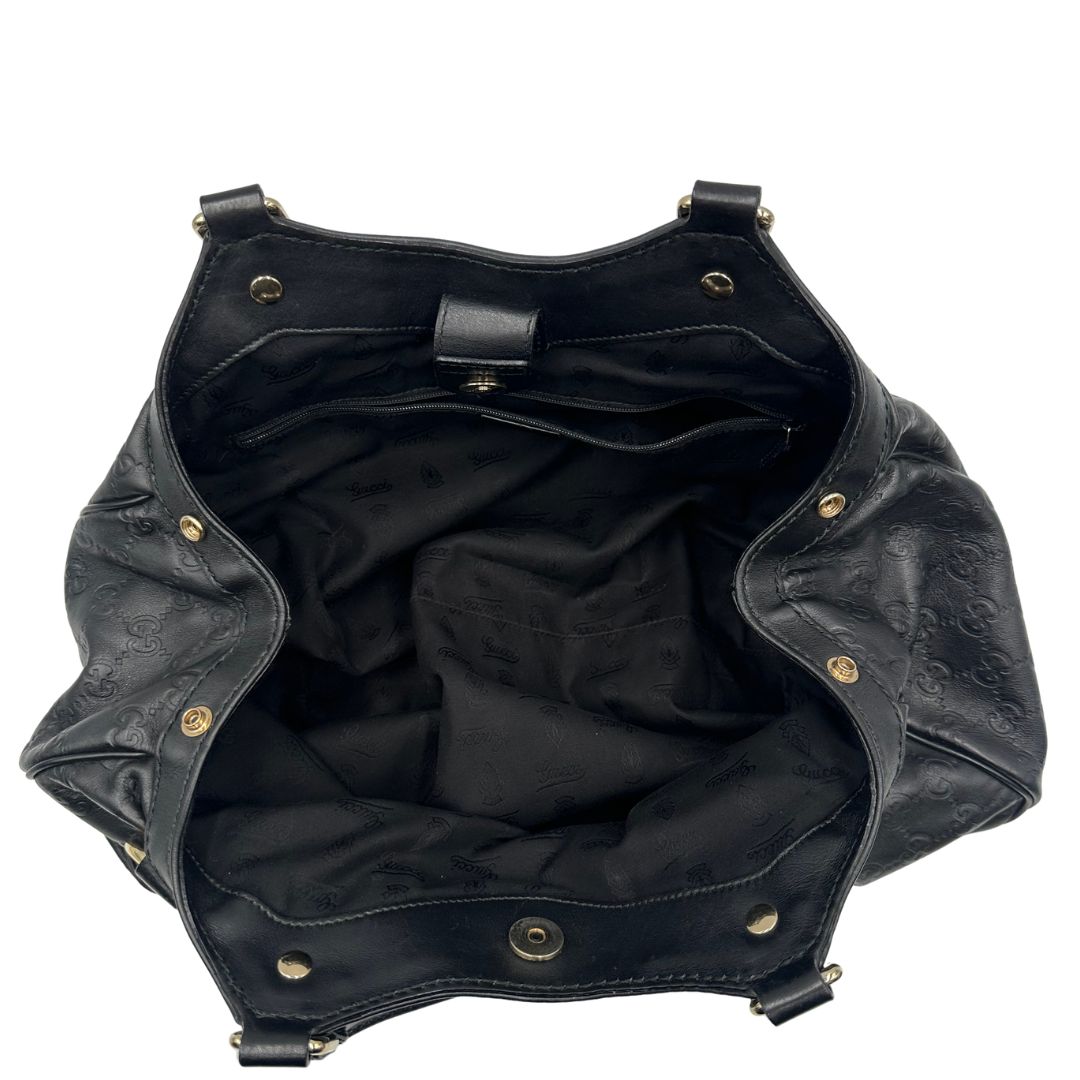 interno Borsa Gucci in pelle nera GG, munita di doppi manici, di lusso, originale, ottime condizioni, usata.