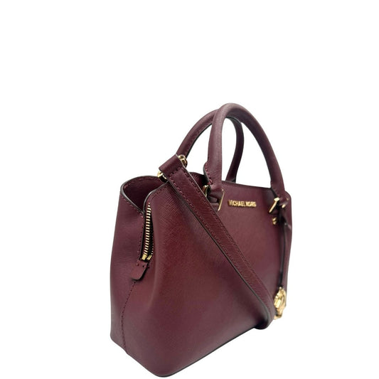 lato Borsa MK in pelle saffiano color vinaccia, di lusso, originale, ottime condizioni, usata.