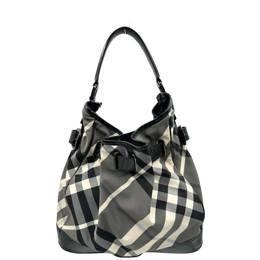 Front di una borsa Burberry in poliammide e acrilico trama tartan, con finiture nere lucide, usata, originale, second hand, in ottime condizioni.