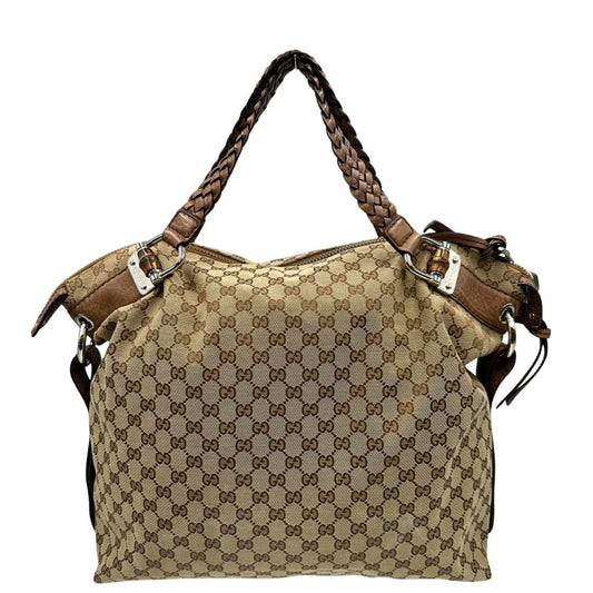 Front, Borsa Gucci in tessuto GG beige, munita di manici in pelle intrecciata e i caratteristici inserti in bamboo sugli attacchi dei manici. Originale, usata, di lusso, in ottime condizioni.