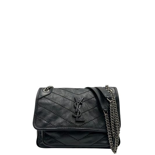 Borsa Niki Saint Laurent nera nella versione baby, di lusso, originale, ottime condizioni, usata.