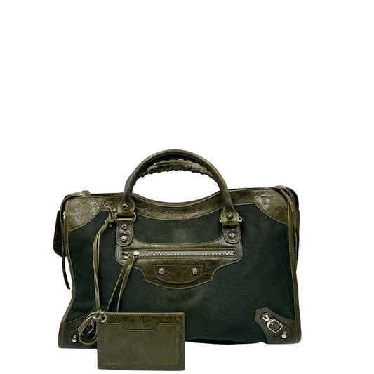 Front, Borsa Balenciaga caratterizzata da una struttura in pelo di cavallino verde scuro con finiture e dettagli in pelle. Originale, usata, di lusso, in ottime condizioni.
