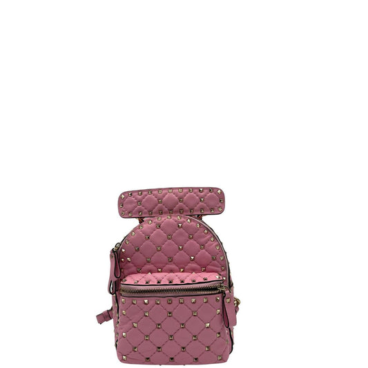 front Zaino V. G. in pelle rosa impreziosito da borchie piramidali su tutta la superficie, di lusso, originale, ottime condizioni, usato.