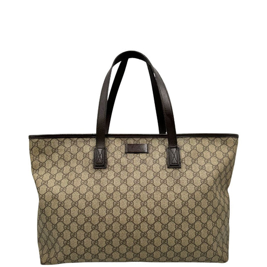 front Borsa Gucci in canvas GG beige, munita di doppi manici in pelle marrone, puoi portarla comodamente a spalla, di lusso, originale, ottime condizioni, usata.