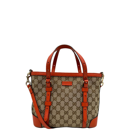 front Borsa Gucci in tessuto GG con finiture in pelle arancione, munita di doppi manici e una tracolla amovibile e regolabile, di lusso, originale, ottime condizioni.