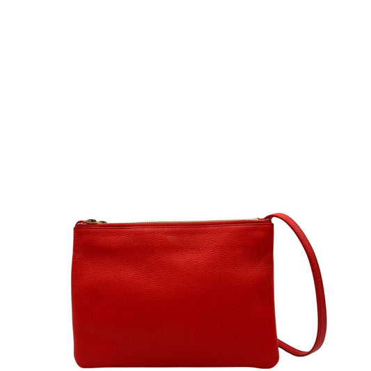 front Borsa Celine Trio in pelle color rosso corallo e hardware dorato, di lusso, originale, ottime condizioni, usata.