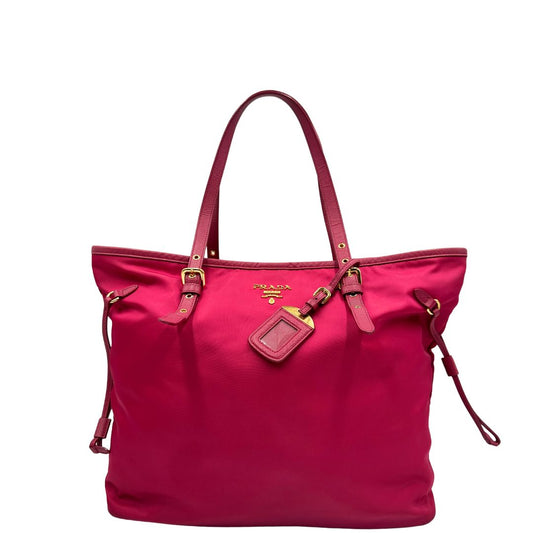 Front, Borsa Prada in nylon fucsia con hardware dorato. Originale, usata, di lusso, in orrime condizioni.