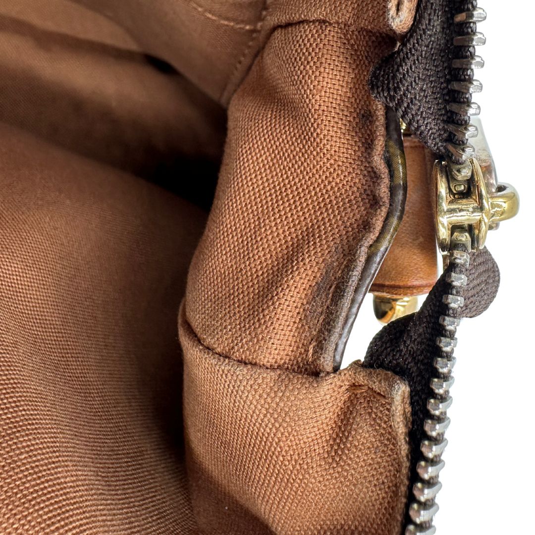 interno Borsa LV in canvas marrone monogram con finiture in vacchetta naturale