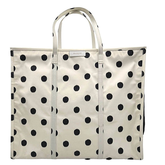 Foto borsone Balenciaga a pois e tessuto bianco. Borse di marca usate