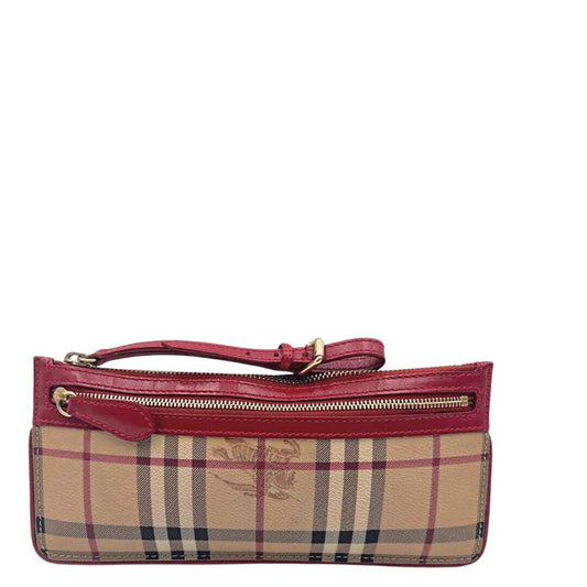 Foto pochette Burberry tartan con profili rossi. Borse di marca usate